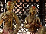 Kathmandu Changu Narayan 20 King Bhupatindra Malla And His Queen Kneel In a Gilded Cage Before The Main Entrance To Changu Narayan Temple King Bhupatindra Malla, the ruler of Bhaktapur from 1696 to 1722, and his queen kneel in a gilded cage in front of the main entrance to Changu Narayan Temple in the Kathmandu Valley.